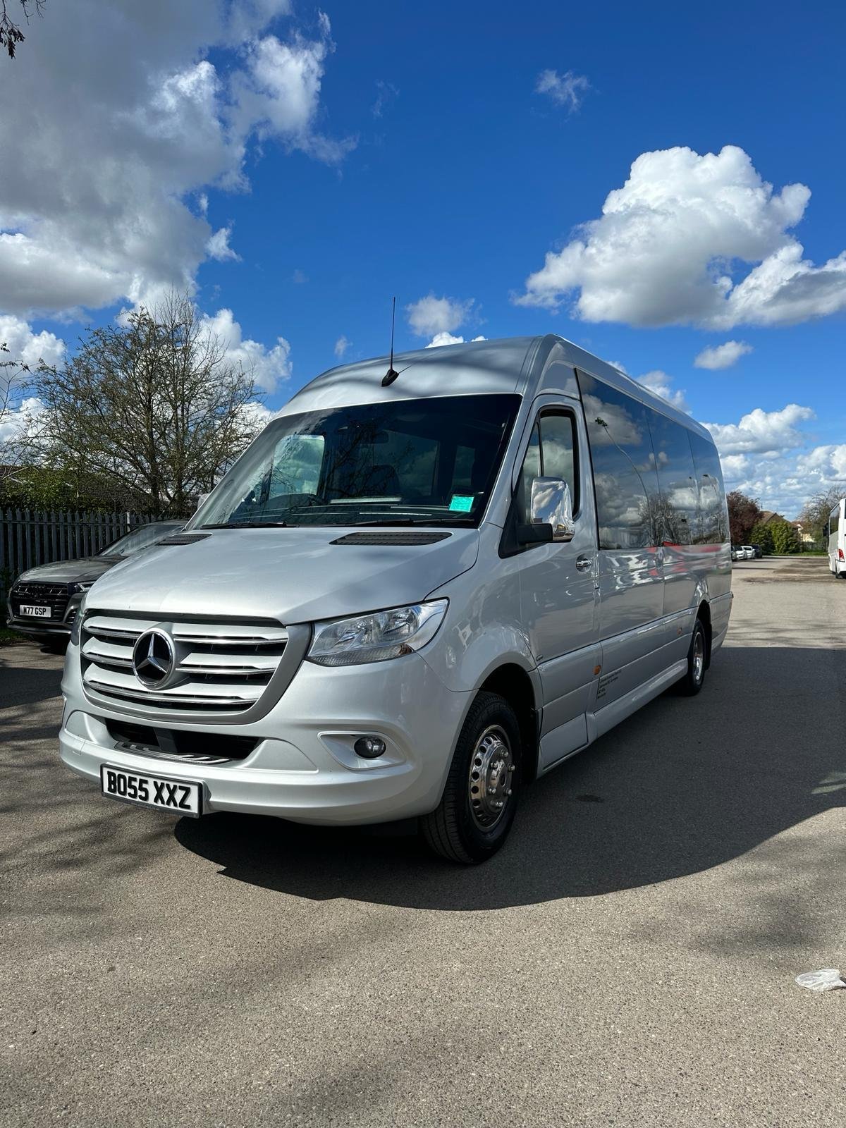 White Mercedes luxury wedding guest transport vehicle used for coordinated wedding travel by MCR EXEC