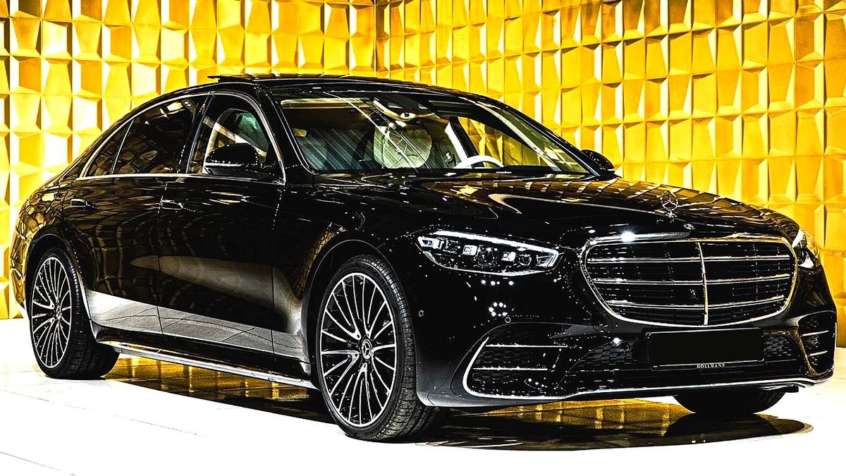 Luxury Car on Red Carpet Outside Elegant Venue