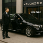 Executive chauffeur with black Mercedes S-Class transporting client from Leeds to Manchester - MCR EXEC