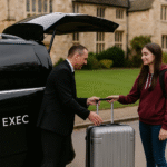 MCR EXEC chauffeur helping a University of York student load luggage into a premium vehicle en route to Manchester Airport