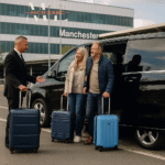 Chauffeur assists group of travellers with luggage for a luxury minibus transfer from Ambleside to Manchester Airport