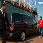 Professional chauffeur opening a luxury vehicle for Indian football tourists outside Manchester United stadium - MCR EXEC