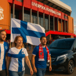 Finnish Liverpool FC fans arriving at Anfield with MCR EXEC chauffeur service, luxury Mercedes MPV, Finland flags, vibrant match day atmosphere.