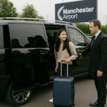 A professional chauffeur loading a student's luggage into a luxury MPV outside Leeds University halls, preparing for airport transfer