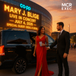 Woman in red gown stepping out of black Mercedes V-Class, greeted by a MCR EXEC chauffeur outside Co-op Live for Mary J. Blige concert on 4 July 2025