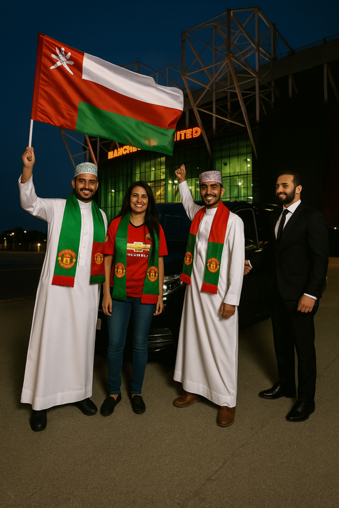 Three Omani football fans stand proudly outside Old Trafford with a luxury Mercedes MPV and MCR EXEC chauffeur.
