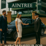 MCR EXEC chauffeur welcomes a race-ready couple at Aintree Racecourse in front of a black Mercedes-Benz during the Grand National.