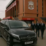 Luxury Mercedes chauffeur vehicle outside a football stadium (Anfield, Old Trafford, Etihad ) for VIP hospitality guests.