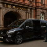 Chauffeur to Midland Hotel Manchester – black 2025 Mercedes V-Class parked outside the hotel with chauffeur, MCR EXEC logo in top right.