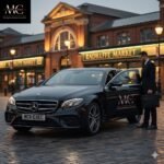 Executive Transfers Radcliffe – black Mercedes E-Class chauffeur by MCR-EXEC outside Radcliffe Market Hall.