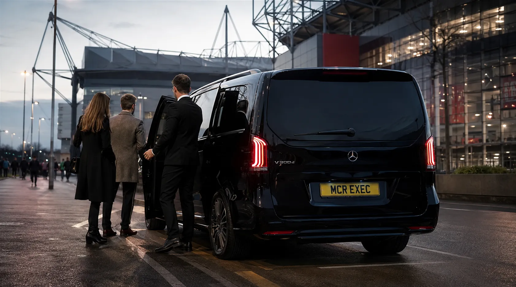 Mercedes V-Class chauffeur service arriving at a Manchester football stadium