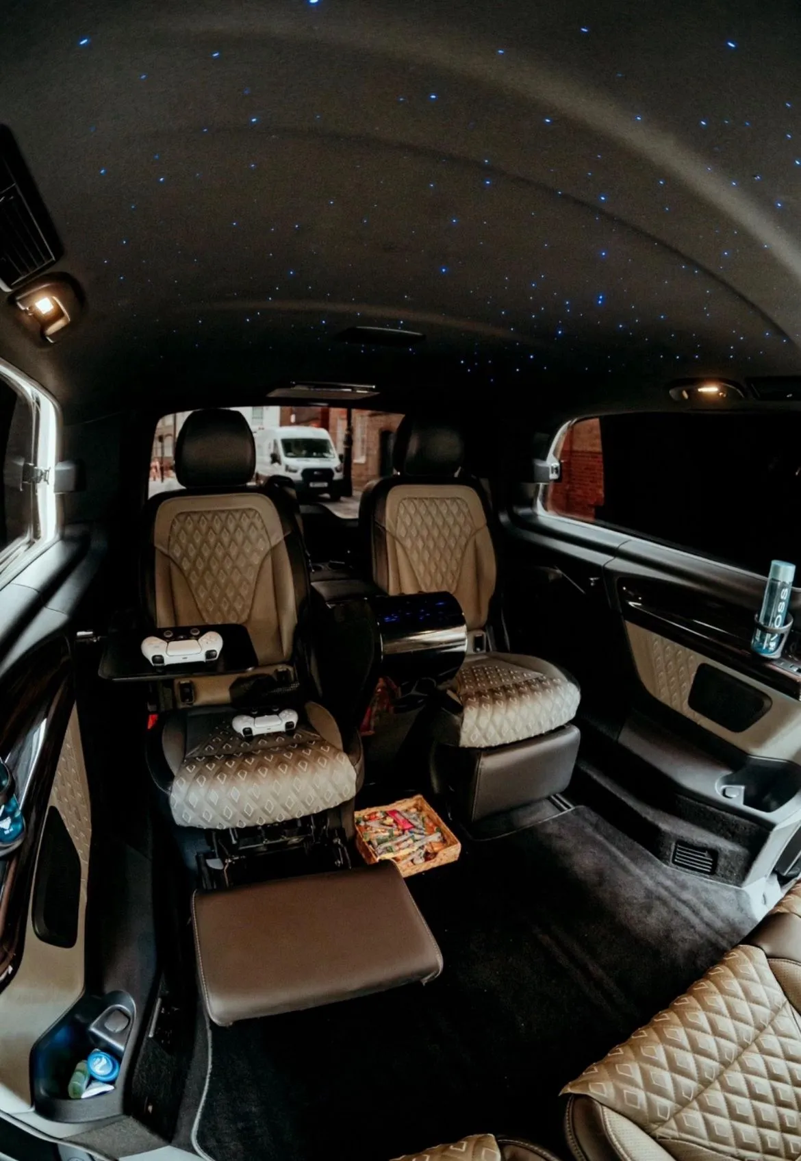 AC13-style fully custom prom car hire Manchester interior with captain seats and luxury chauffeur-driven V-Class cabin