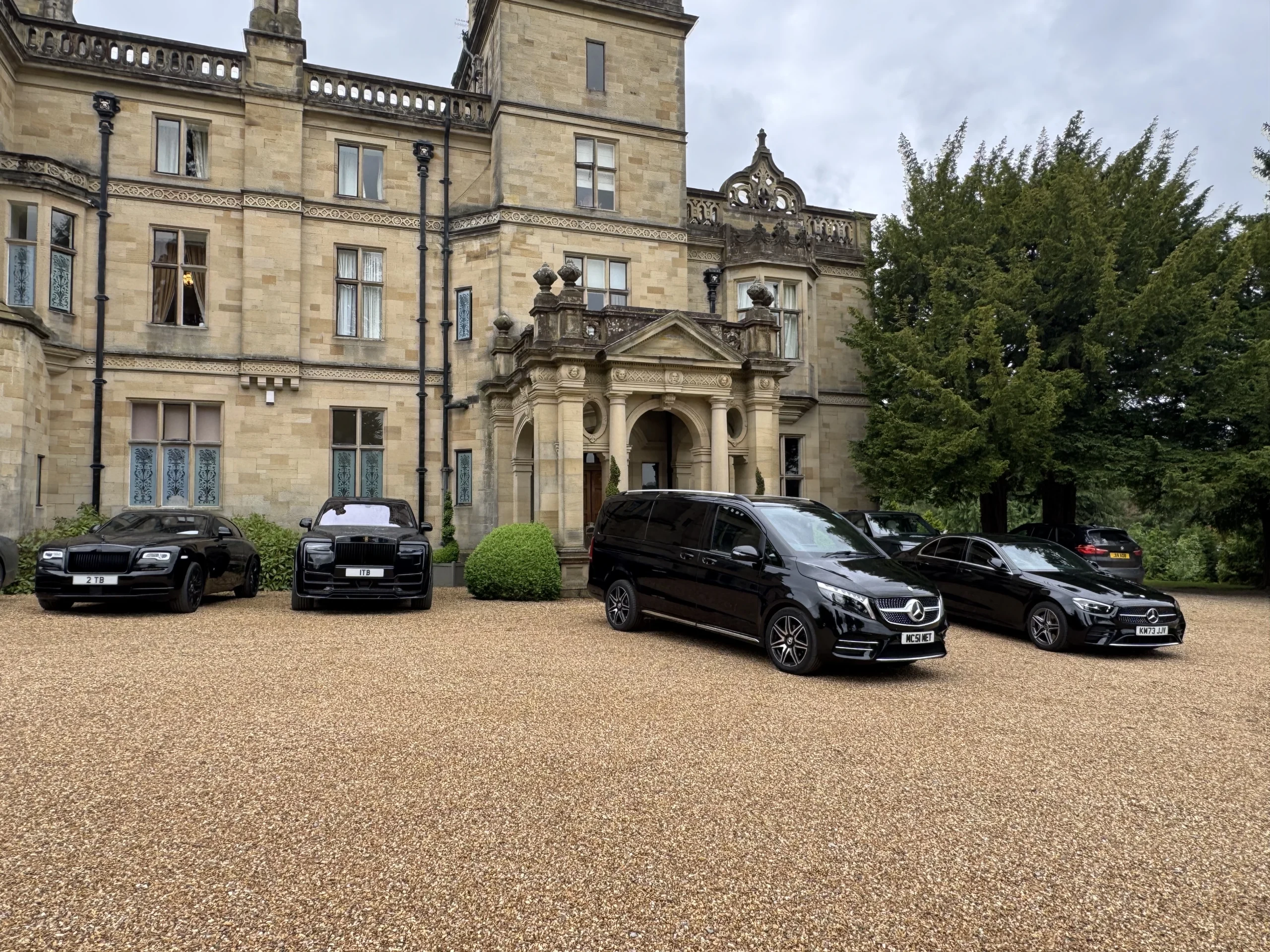 Private Chauffeur Tours UK Mercedes V-Class and premium vehicles at a British country estate for a bespoke multi-day itinerary