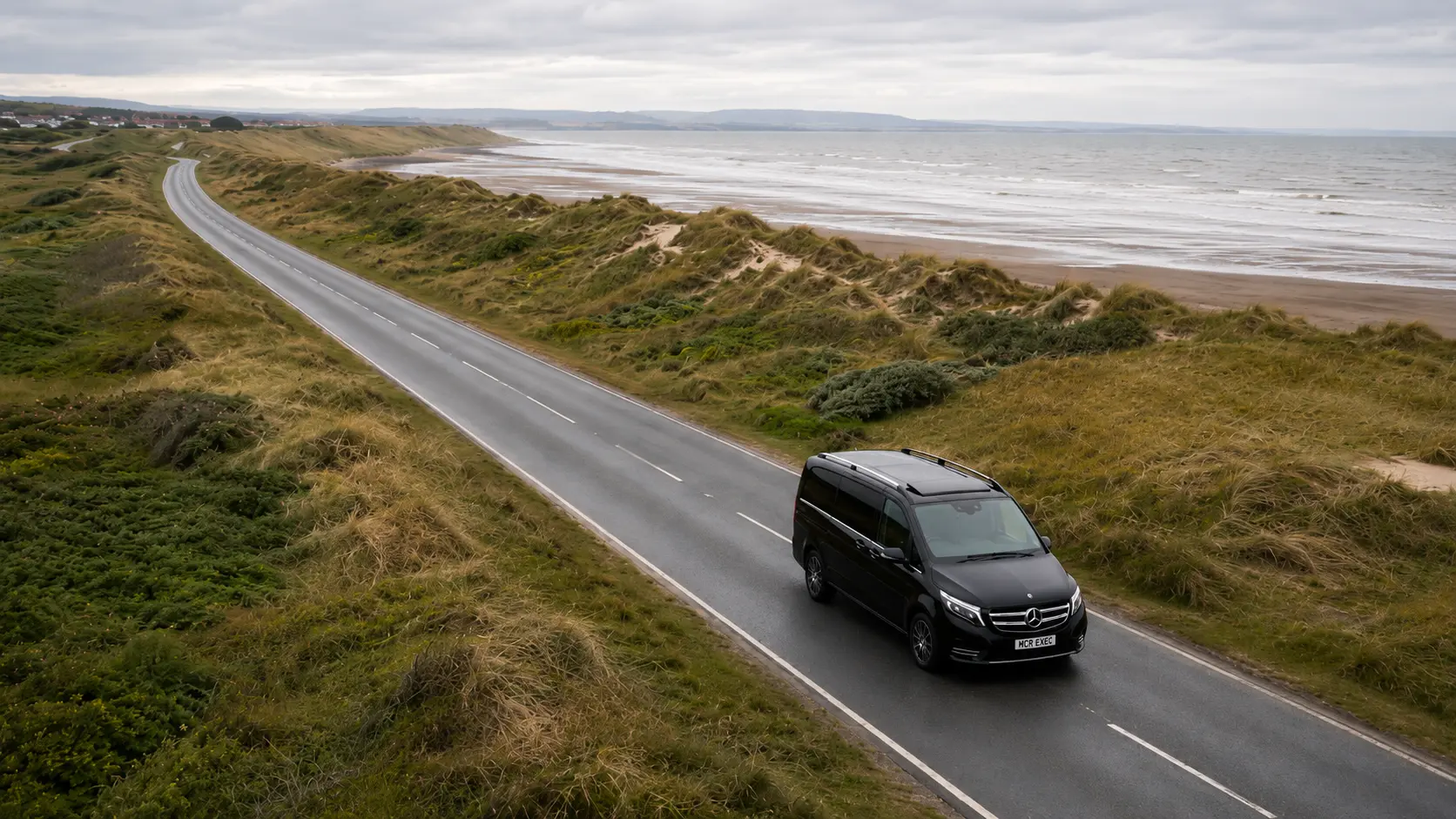 Mercedes V-Class driving through a North West England coastal links golf region