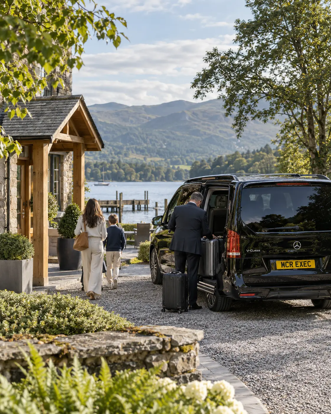 Family arriving for a pre-booked Windermere hotel stay with an MCR EXEC Mercedes V-Class