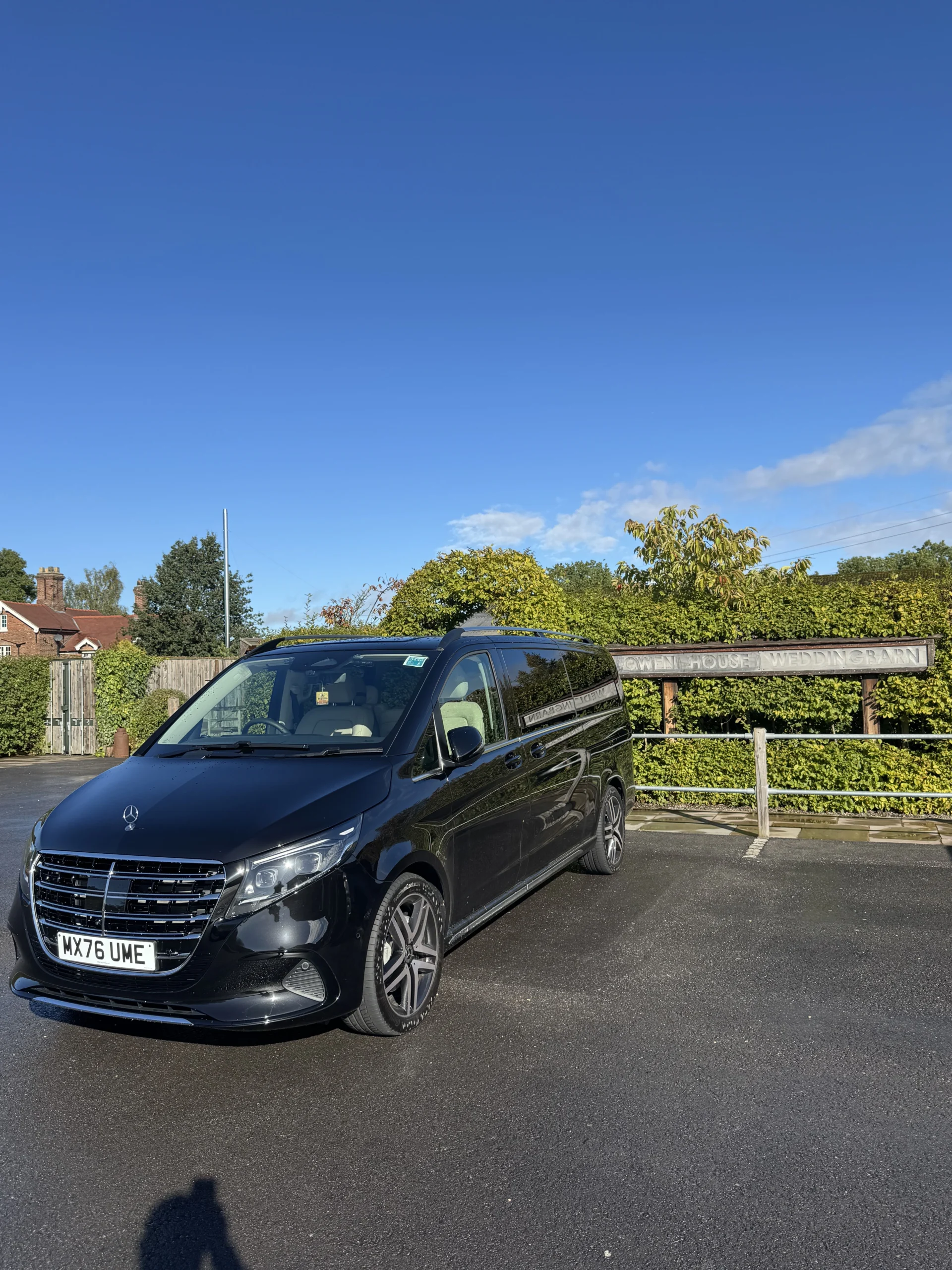 Black MCR EXEC Mercedes V-Class parked beside a rural fence during the DAZN shoot in Mobberley