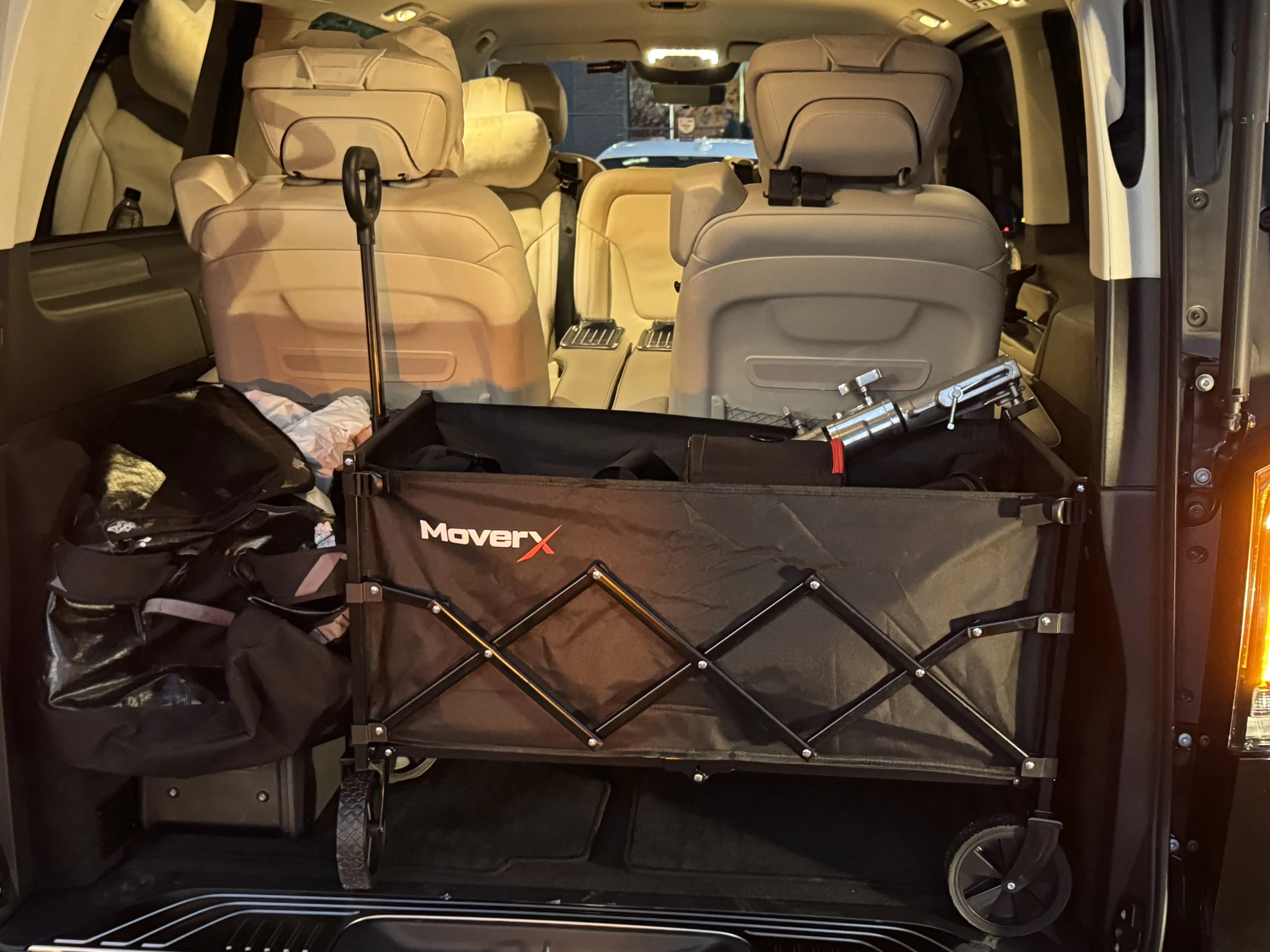 Production cases and a folded equipment trolley in the rear of the customised Mercedes V-Class